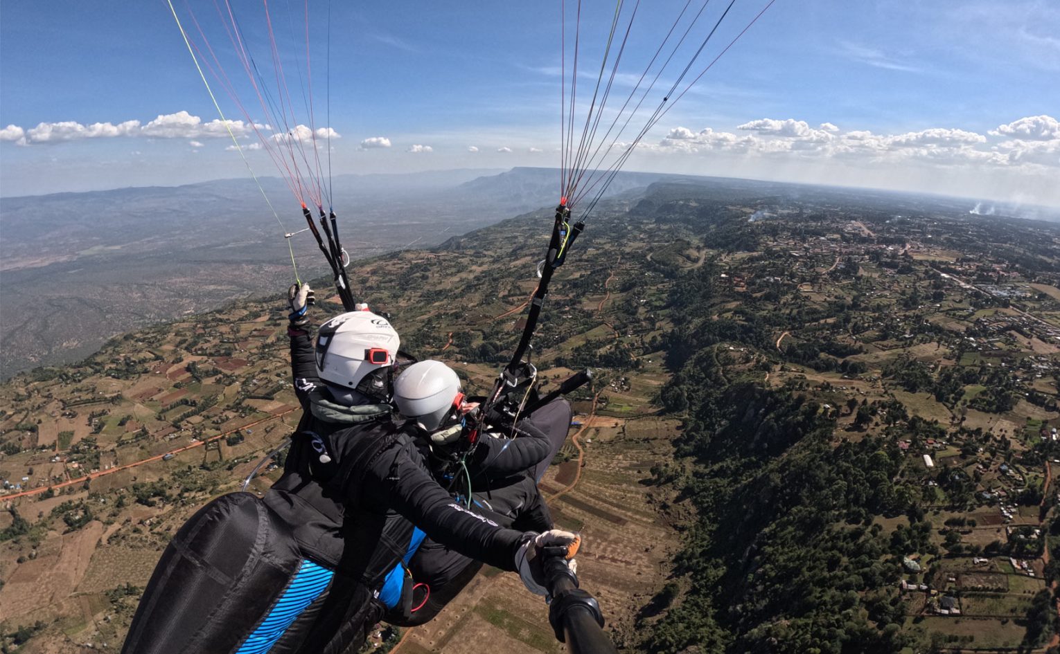 Close-up of paragliding harness and reserve parachute
